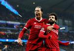  Virgil Van Dijk (tv.) og topscorer Mohamed Salah, der er tidligere Roma-spiller, skal en tur til Rom for at løse billet til Kijev.  Foto: Andrew Yates/Ritzau Scanpix. /Ritzau Scanpix