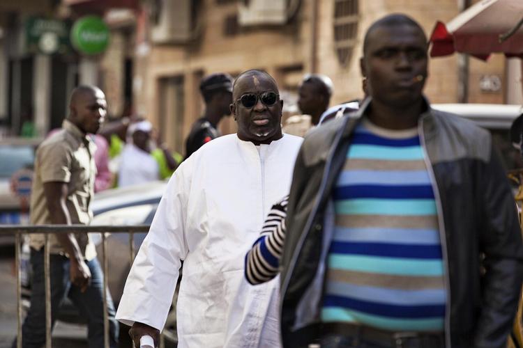 Senegalesiske Papa Massata Diack i den hvide dragt er involveret i flere sager om korruption i idrættens verden – både om forsvundne russiske dopingprøver og stemmekøb, da Rio de Janeiro vandt OL-værtskabet. 