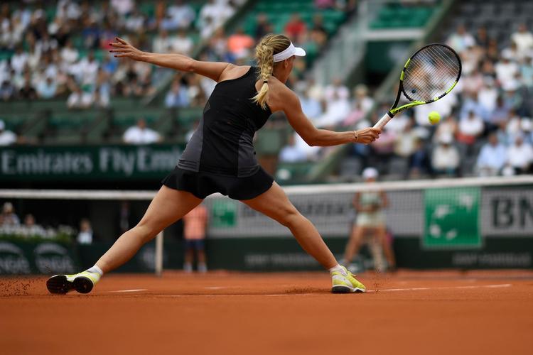 Det kræver en stor omstilling at gå fra hard court til grus, forsikrer  Caroline Wozniacki.  Foto: Christophe  Simon, AFP / Ritzau Scanpix /Ritzau Scanpix