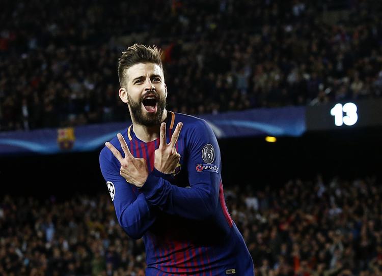  Gerard Piqué har haft stor succes i Champions League, men han  understreger, at det er La Liga, der giver det daglige brød for Barca-spillerne.  Manu Fernandez/AP